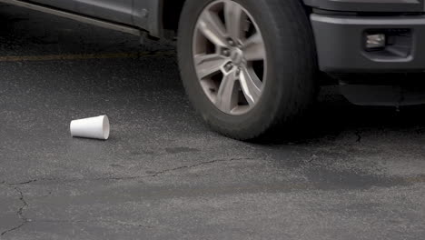 Styrofoam-cup-being-blown-around-in-the-street