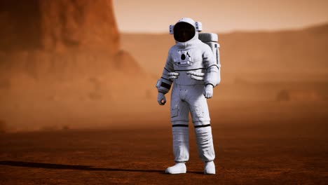 astronauta en la superficie de marte. planeta rojo cubierto de gas y roca