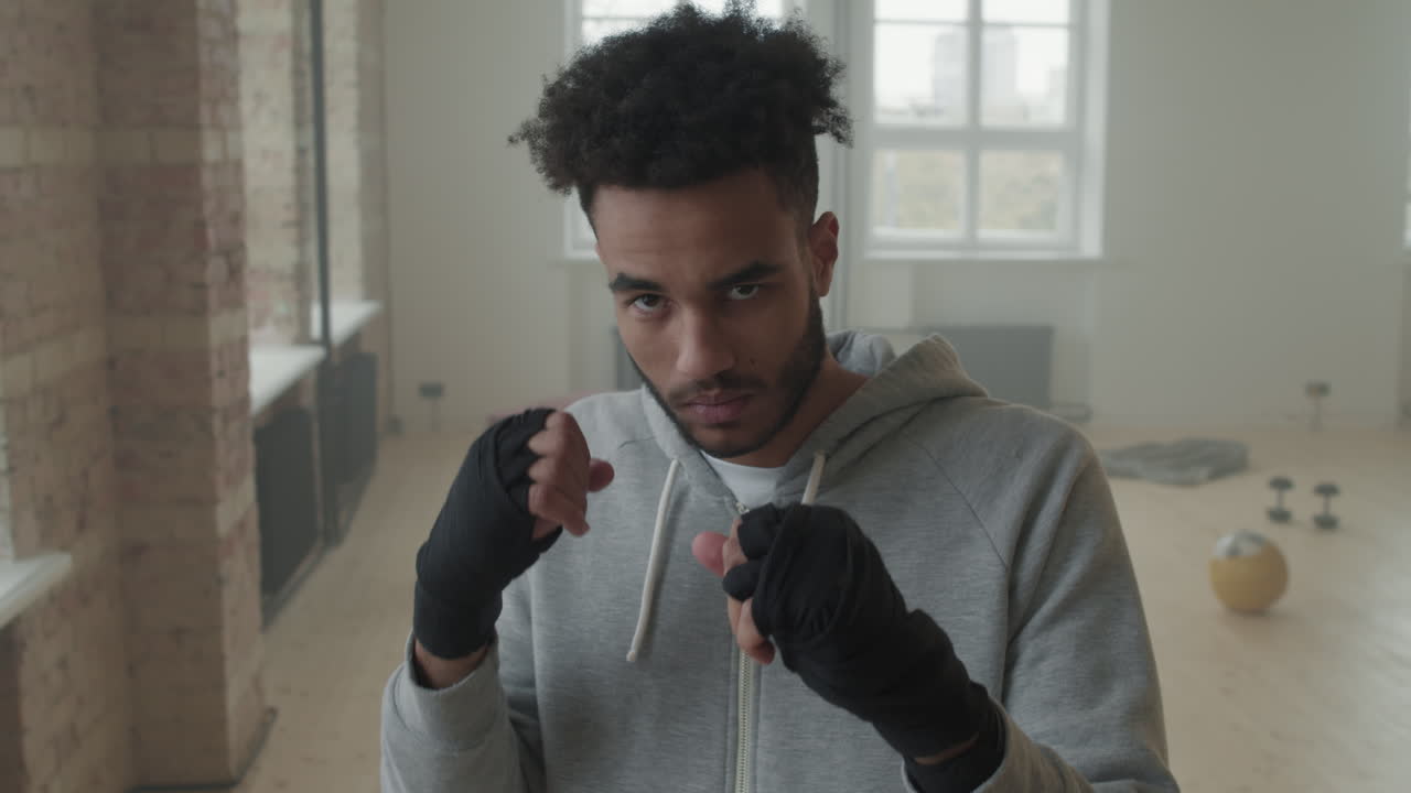 Black Boxer In Combat Stance During Training