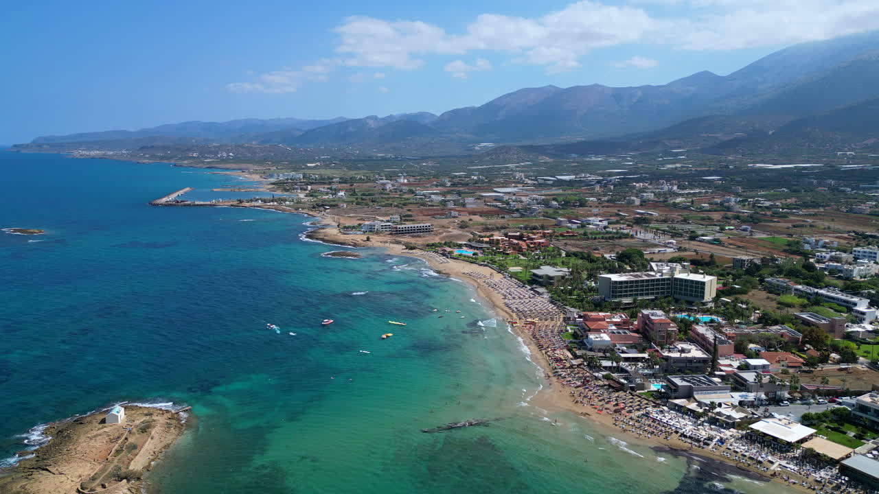 Aerial: Beautiful Coastline And Turquoise Water Of Malia, Crete