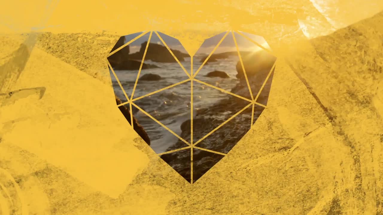 costa y rocas en el mar a través del primer plano en forma de corazón amarillo