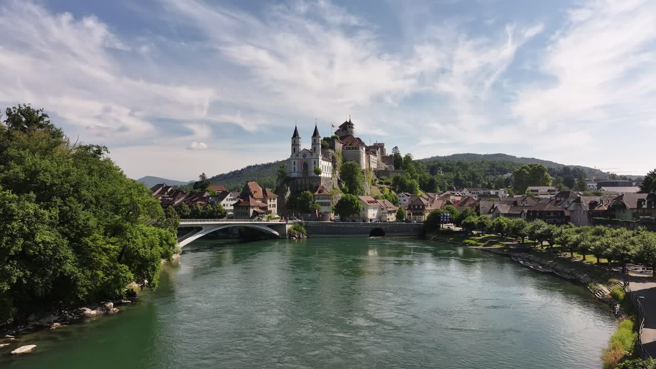 Aarburg Castle and church overlooking the Aare River on a sunny day in Switzerland