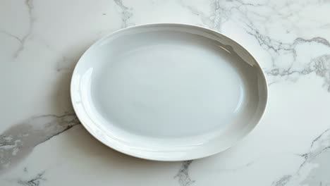 white plate on marble surface