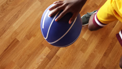 basketball player practicing dribbling drill