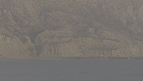 coastal view with cliffs and fog