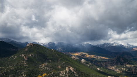 rocky mountains daytime fall timelapse as storm clouds move over landscape, 4k