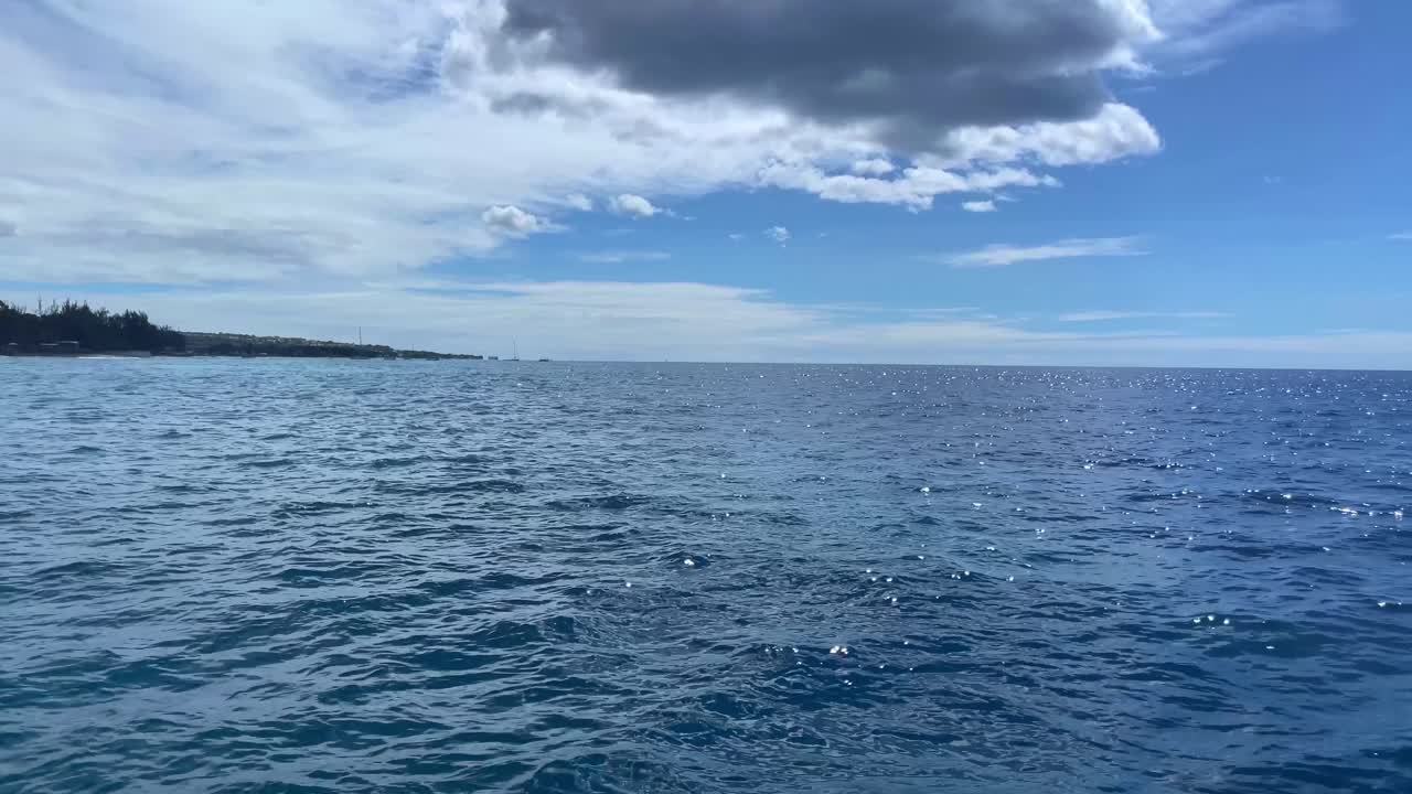 Waves and horizon off the front of boat, Barbados 4K UHD