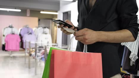 man shopping on phone