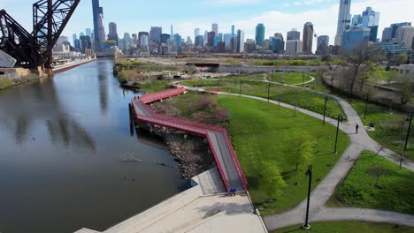 eco-friendly city park with chicago downtown skyline drone