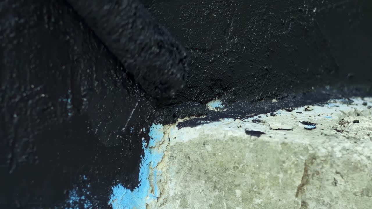 Close-up of a dark textured wall