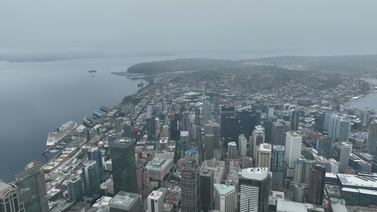 Aerial view of Seattle's skyscrapers surrounded by fog