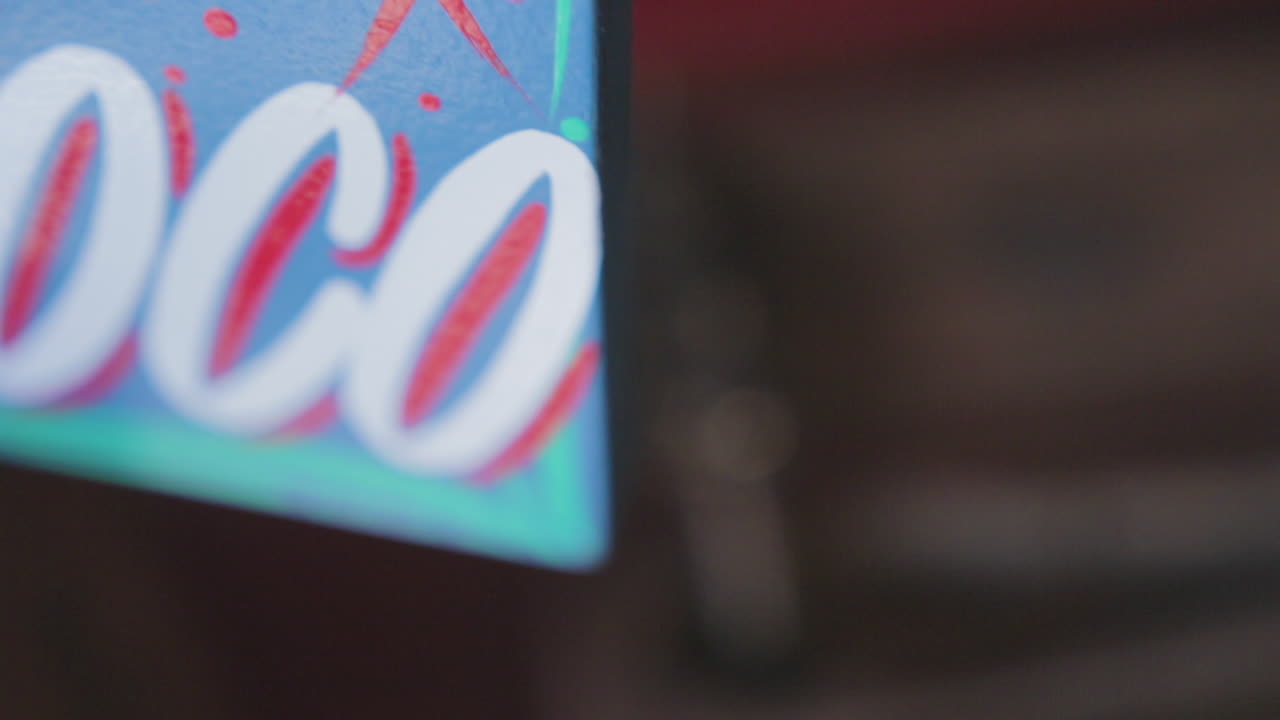Close-up of an Antique Bronze Figurine in a Wooden Box