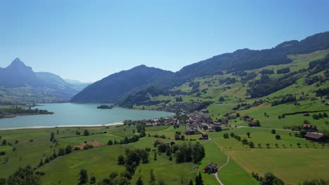 swiss village with lake and mountain view