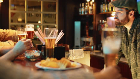 men spending evening in pub