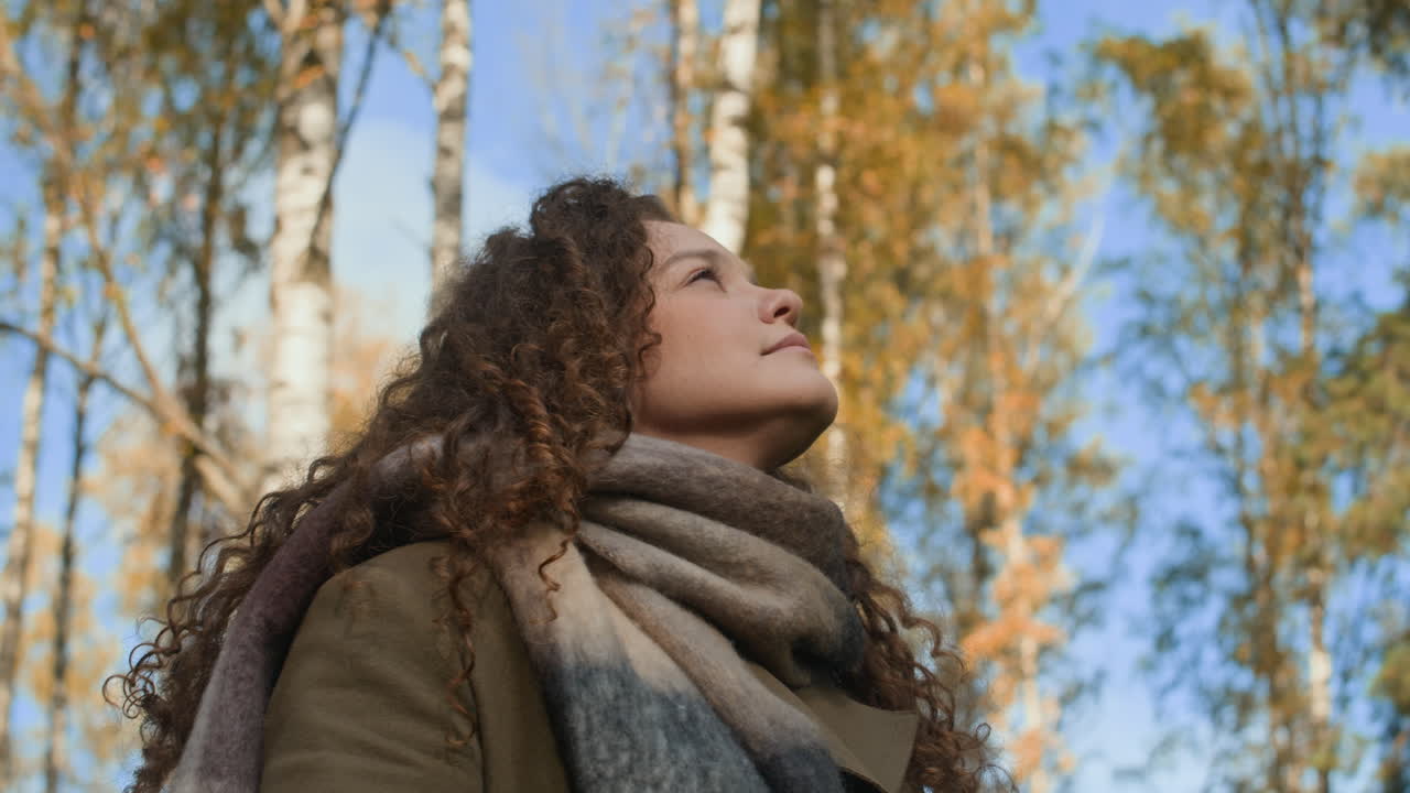 Woman enjoying autumn outdoors