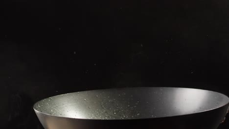 cooking mushrooms in a wok