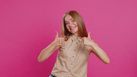 Young-woman-raises-thumbs-up-agrees-or-gives-positive-reply-recommends-advertisement-likes-good-idea