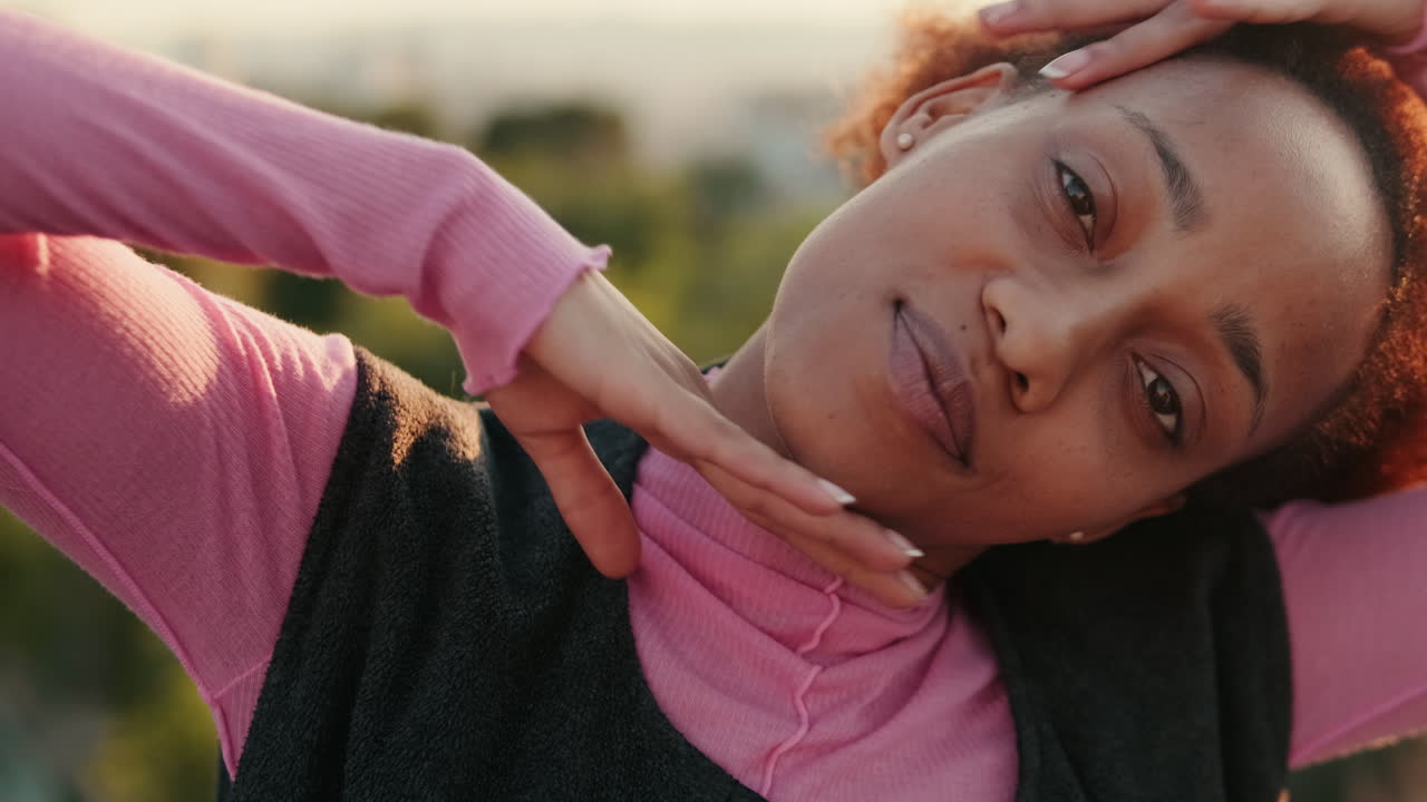 Young Woman Dances in Golden Sunset Light