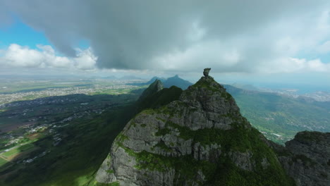 flying fpv drone aerial over pieter both mountain in mauritius