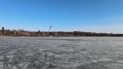wind surfing over a frozen lake, winter sports in minnesota, explore only in mn, meet minneapolis msp