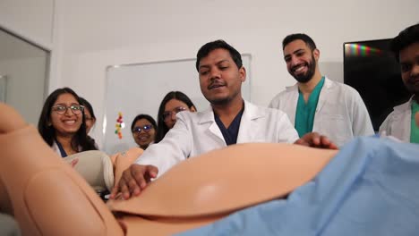 healthcare students gain practical skills through engaging with a detailed simulation model in training sessions.