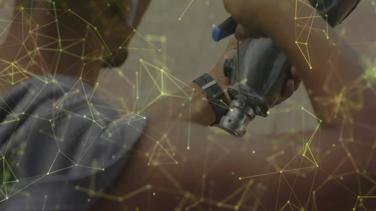 animación de la red amarilla sobre un atleta masculino preparando una pierna protésica para hacer ejercicio al aire libre