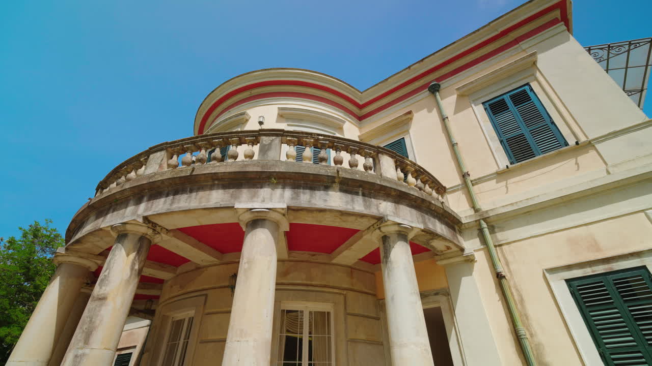 Architectural Building with Columns and Balcony