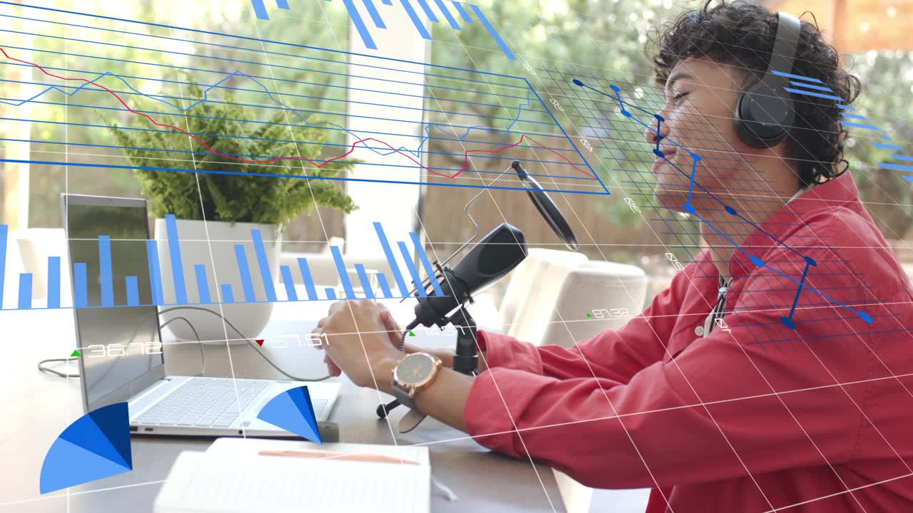 Host leaning forward and speaking into microphone at desk, causing animated blue charts for podcast