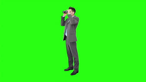 Young-businessman-looking-through-binoculars