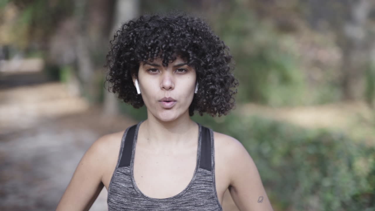 Warming up breathing exercises by a girl in curls