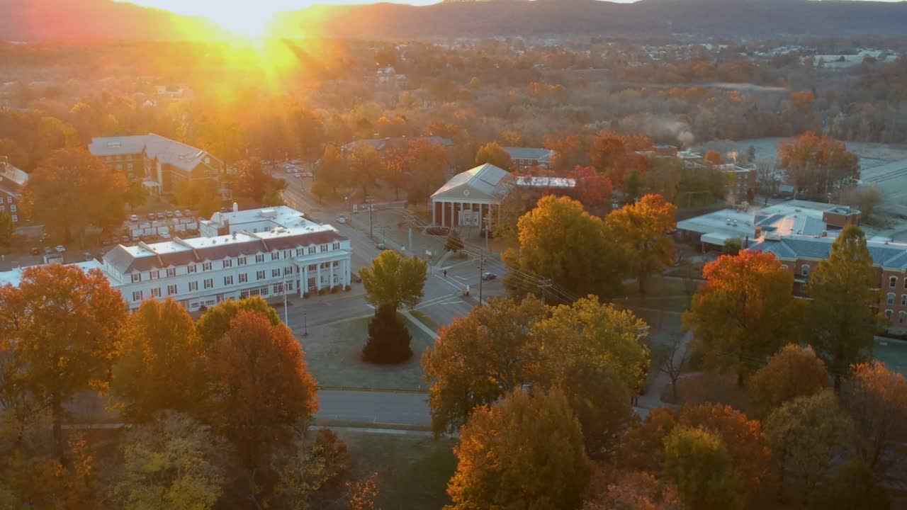 Autumn Sunrise Over a Historic Town or University Campus