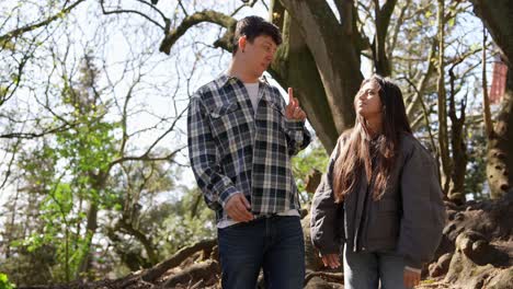 young couple in park conversation