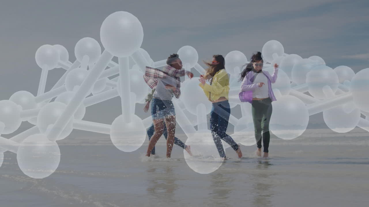 Dancing on beach, people with molecular structure animation overlay in background
