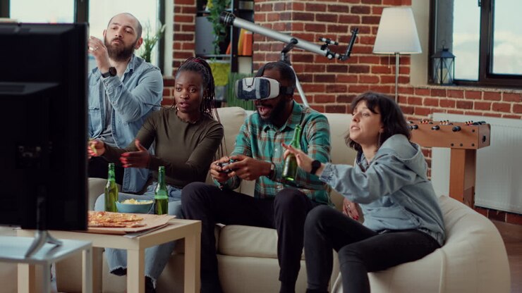 Diverse people using vr glasses to play video games