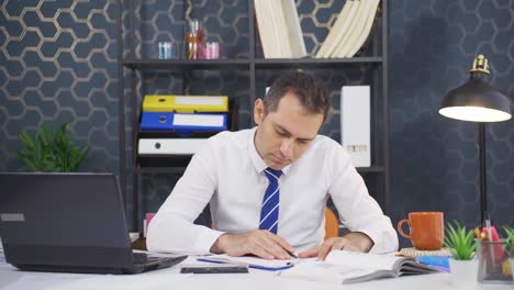 Businessman-signing-paperwork-feeling-happy.