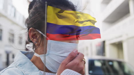 animación de la bandera de colombia sobre una mujer con máscara facial