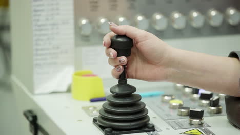 operator controlling machinery with joystick