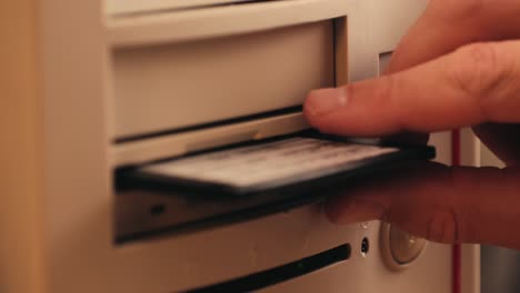 using diskette for old computer. music recorder, playing retro computer games. vintage device for office, obsolete technology. . high quality 4k footage