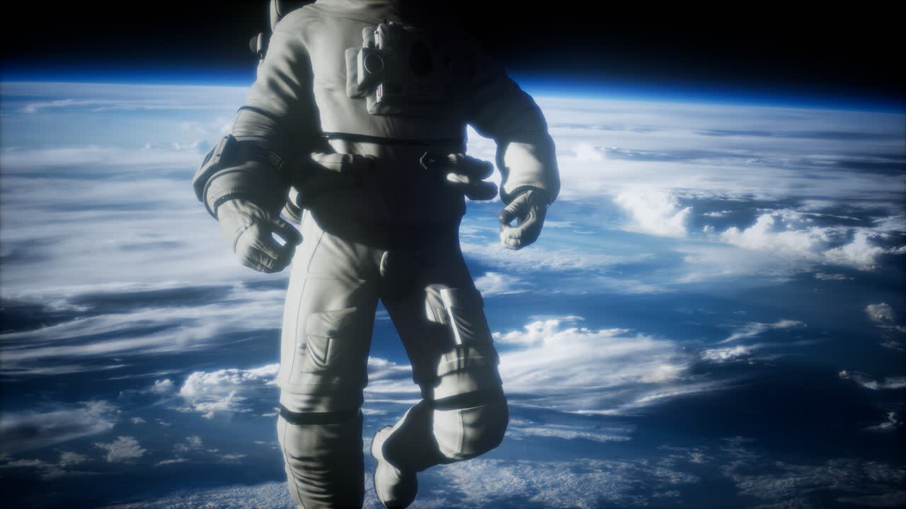 Astronaut i verdensrommet mot bakgrunn av planeten Jorden. Bildet av Jorden er levert av NASA