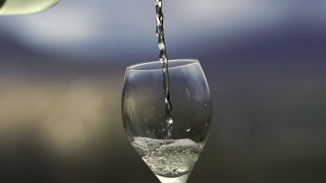 White-wine-being-poured-in-slow-motion-into-a-glass-specifically-designed-for-white-wines