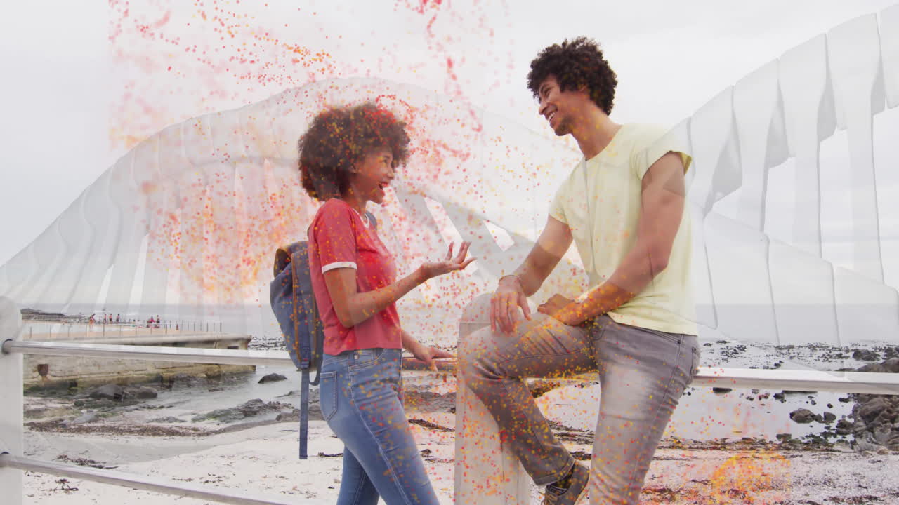 Young couple talking by sea with DNA strand and particles animation