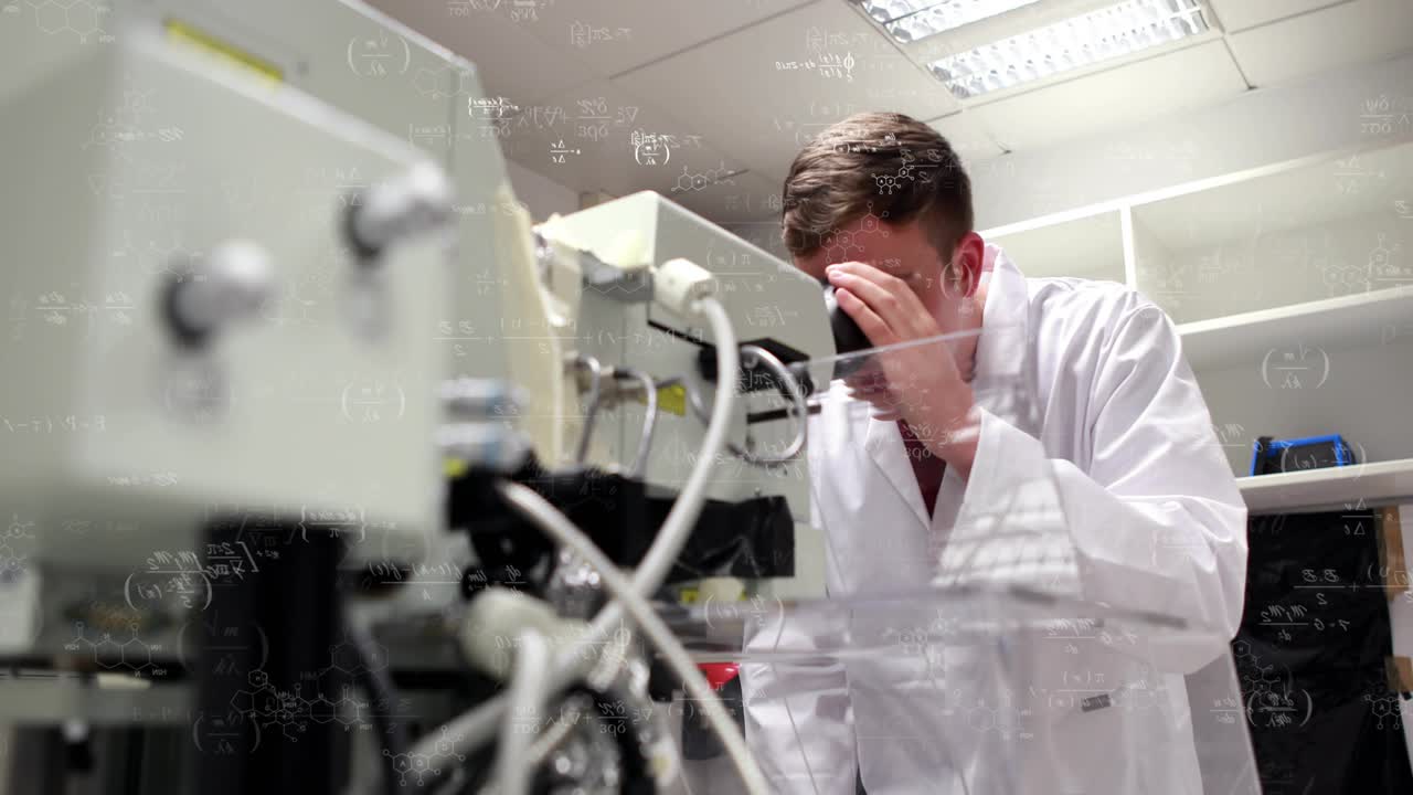 Male tech leaning into scope, tuning knobs at lab while formulas overlaying frame ensuring accuracy