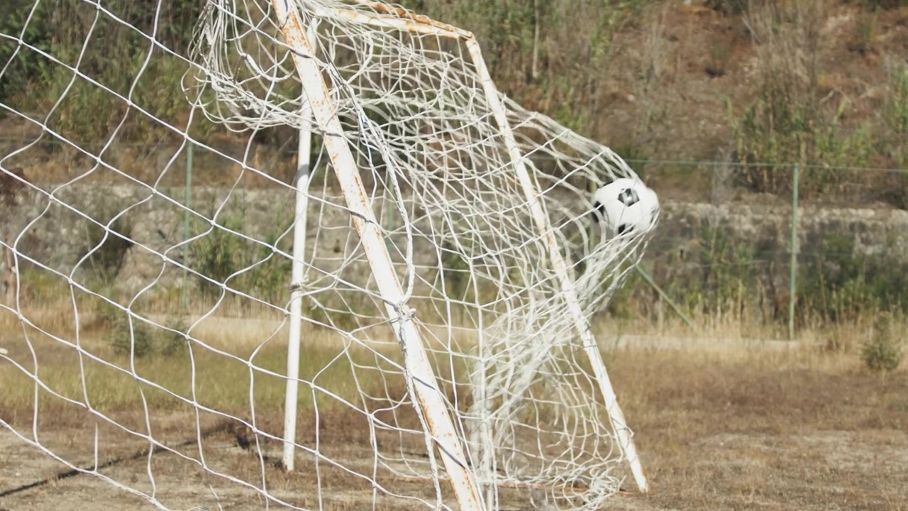 Ball Slowly Entering The Goal After a Shot