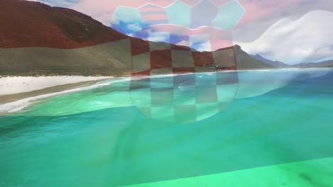 composición digital de agitar la bandera de croacia contra la vista aérea de la playa y las olas del mar