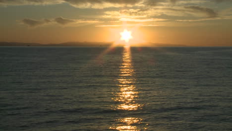 pan of the sun setting over the channel islands and the pacific ocean at ventura california