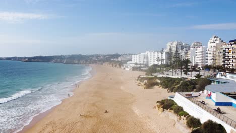 Escape-to-the-picturesque-beauty-of-Algarve's-sandy-beaches-and-coastal-cliffs-Immerse-yourself-in-the-tranquil-ambiance-of-golden-sands,-turquoise-waters