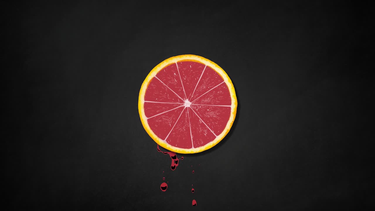 dos rebanadas de naranja girando