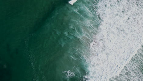 Beautiful-textures-created-by-waves-rolling-onto-sandy-shore