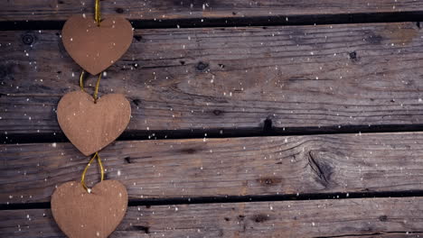 falling snow with christmas hearts decoration