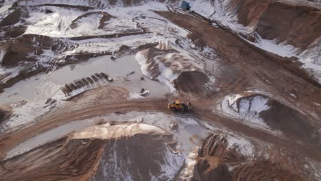 Birdseye-View-of-Front-End-Loader-Working-in-a-Mining-Quarry-in-Denmark---Truck-Shot